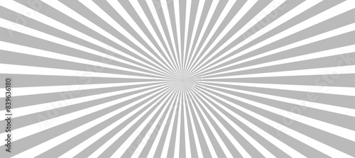 Grey and white sunburst background with rays