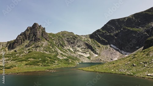 Aerial summertime drone shot of Bliznaka (the Twin) of the seven Rila lakes, in the Rila mountain, Bulgaria.