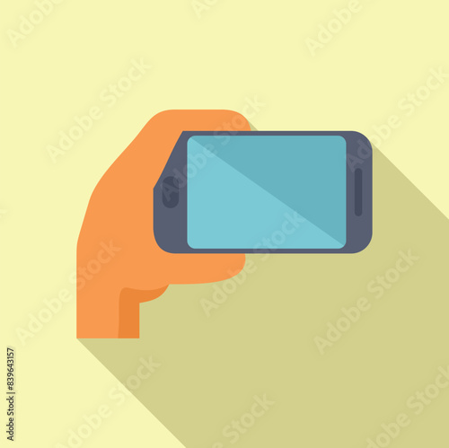 Hand is holding a smartphone horizontally, using it to capture a photo or video