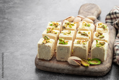 Turkish pismaniye dessert cotton candy on wooden board