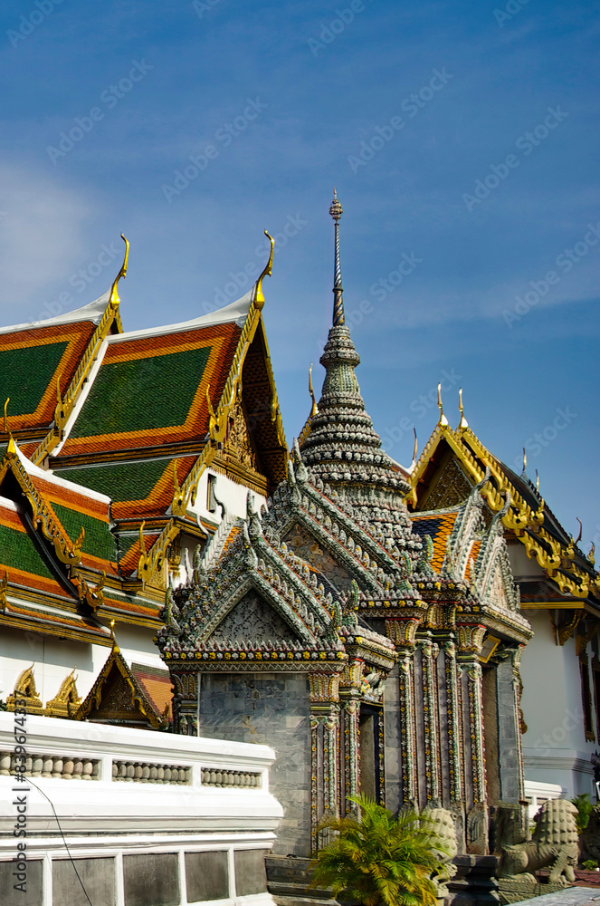 Fototapeta premium The Temple of the Emerald Buddha, also known as Wat Phra Kaew, is a Buddhist temple located inside the Grand Palace in Bangkok (Thailand)