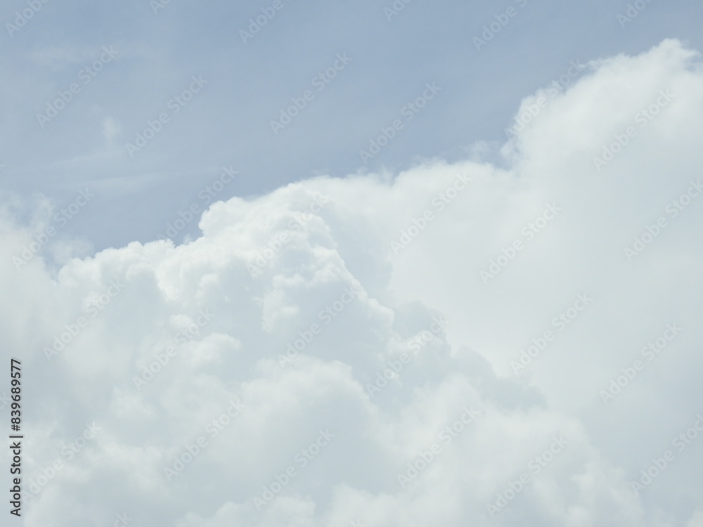 Puffy cumulus clouds forming within a blue sky over Kent County, Delaware. Puffy cumulus clouds forming within a blue sky over Kent County, Delaware.