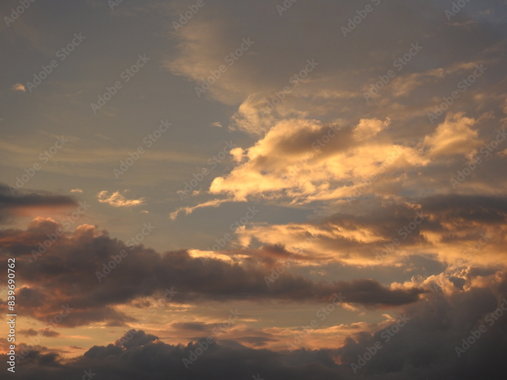 Evening clouds highlighted by the sun over Kent County, Delaware. Cloudscape. Evening clouds highlighted by the sun over Kent County, Delaware. Cloudscape.