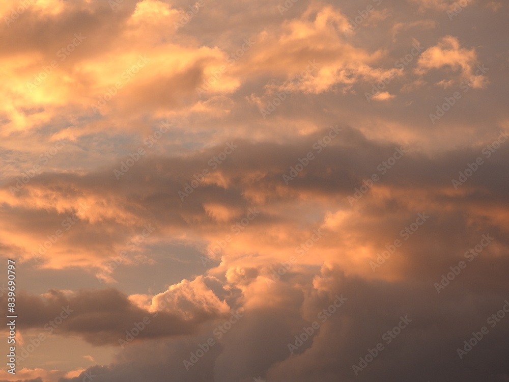 Evening clouds highlighted by the sun over Kent County, Delaware. Cloudscape. Evening clouds highlighted by the sun over Kent County, Delaware. Cloudscape.