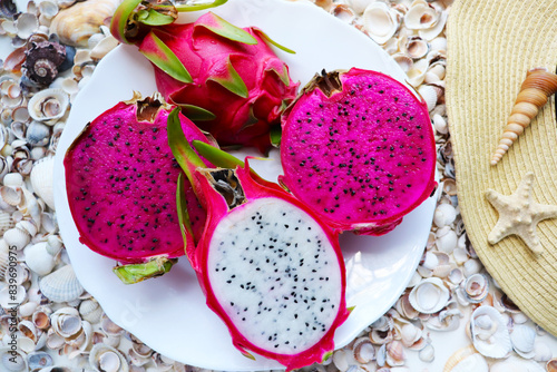 Fototapeta Naklejka Na Ścianę i Meble -  exotic cactus fruits against a background of seashells
