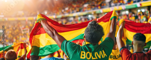 Bolivian football soccer fans in a stadium supporting the national team, La Verde
