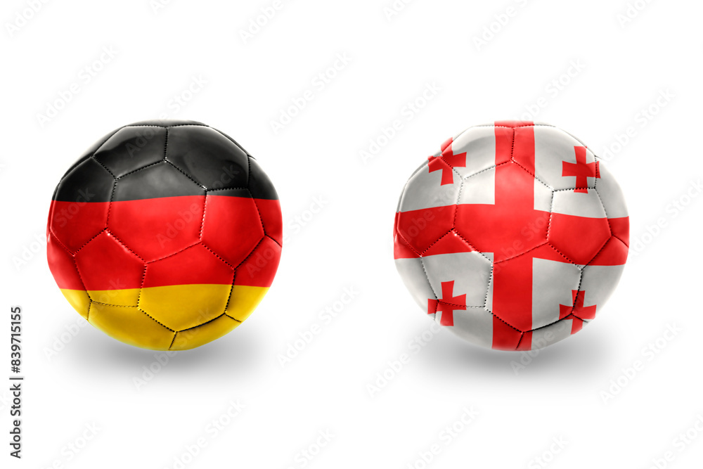 Fototapeta premium football balls with national flags of germany and georgia ,soccer teams. on the white background.