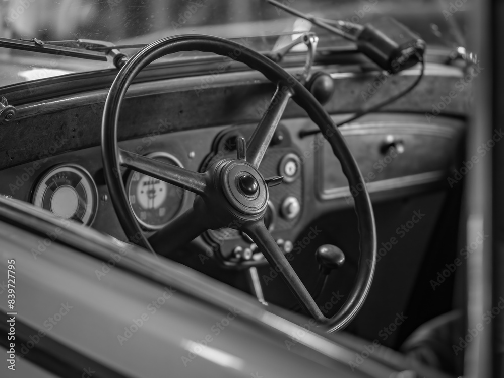 Dashboard and steering wheel of old-timer car Dashboard and steering wheel of old-timer car