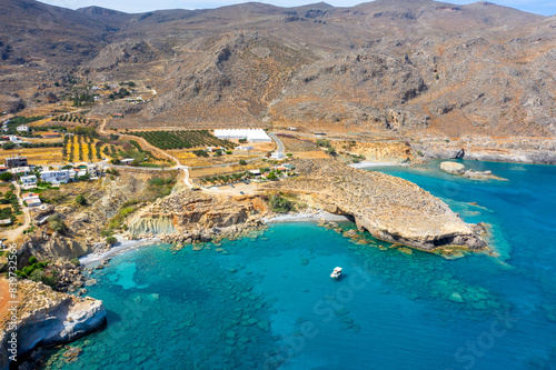 Famous sandy beach of Kalo Nero and Staousa near Makris Gialos, Crete, Greece. photo