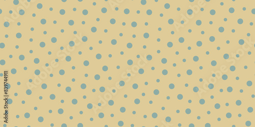 Green random dots on a yellow background. Seamless vector polka dot pattern. Vintage texture circles and spots