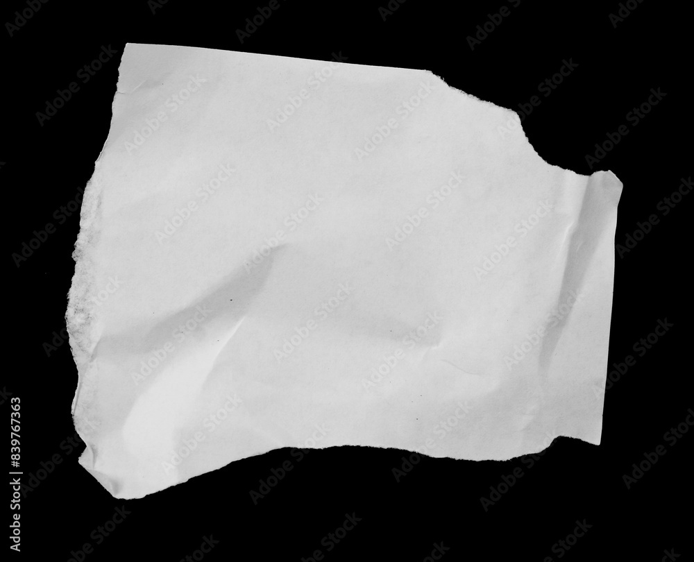 Ripped paper on black background, empty space Ripped paper on black background, empty space
