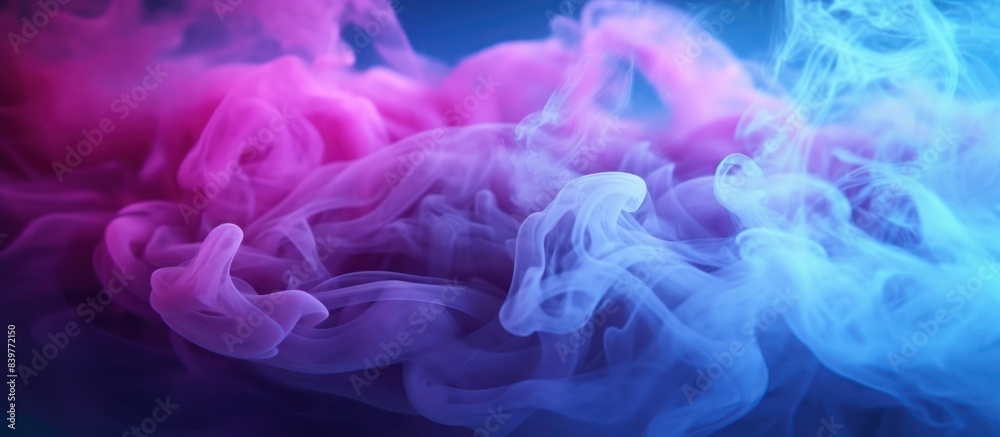 blue and purple gradient colored smoke on a dark background