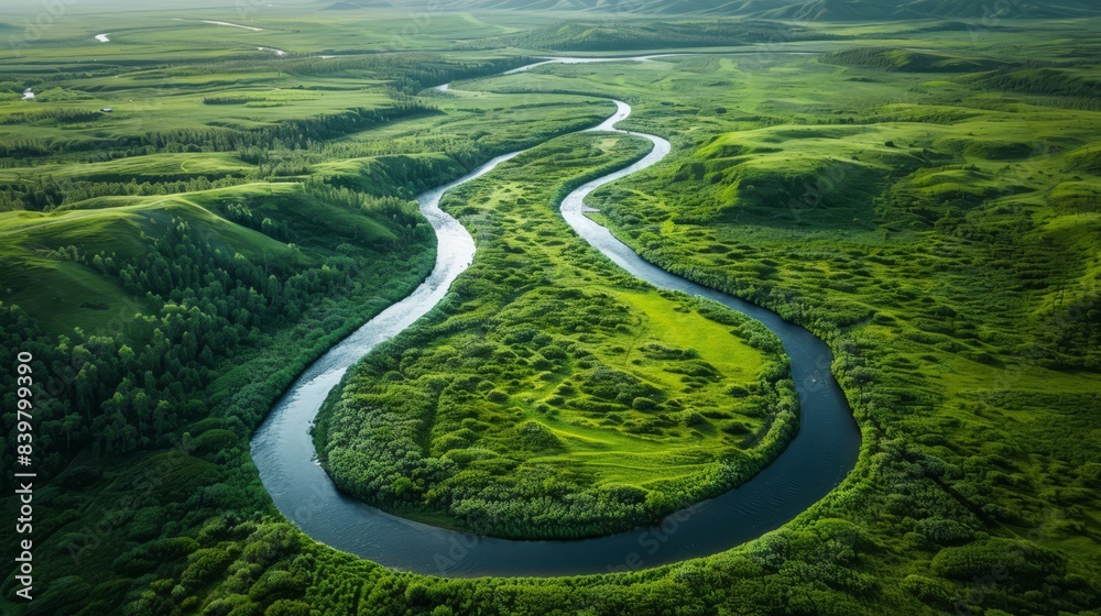 Overhead view of a winding river cutting through a valley, Overhead view of a winding river cutting through a valley,