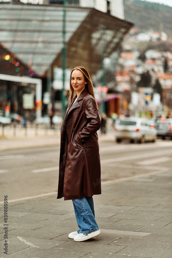 A Casual Girl Poses with Confidence and Style on Urban Streets A Casual Girl Poses with Confidence and Style on Urban Streets