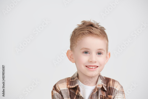 fairhaired smiling boy photo