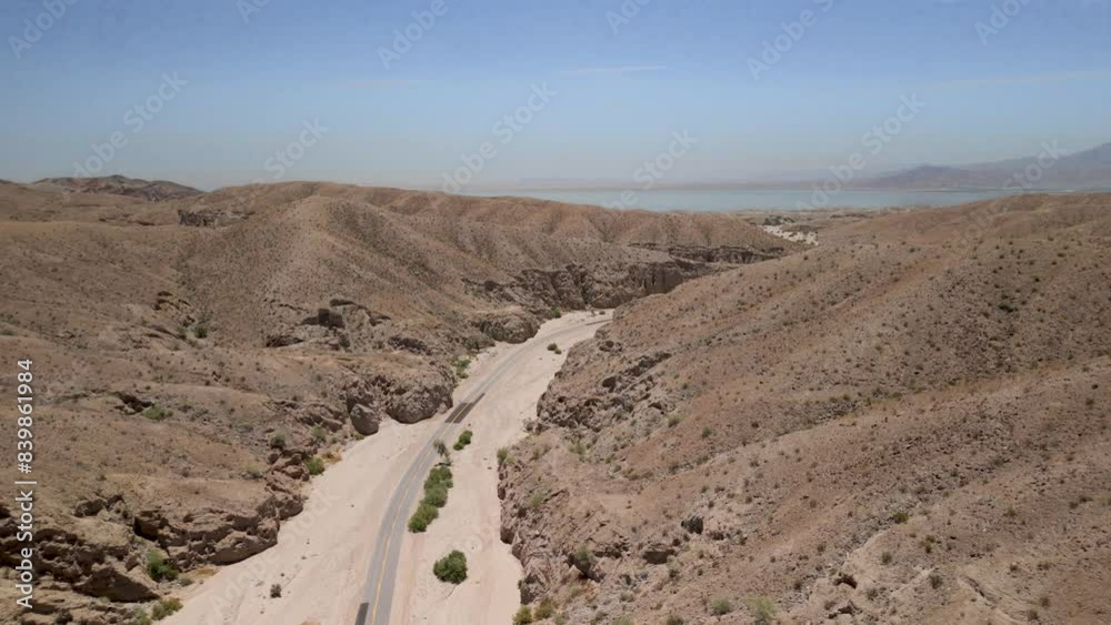 Flying along the highway through the Mecca wilderness towards the Salton Sea Flying along the highway through the Mecca wilderness towards the Salton Sea