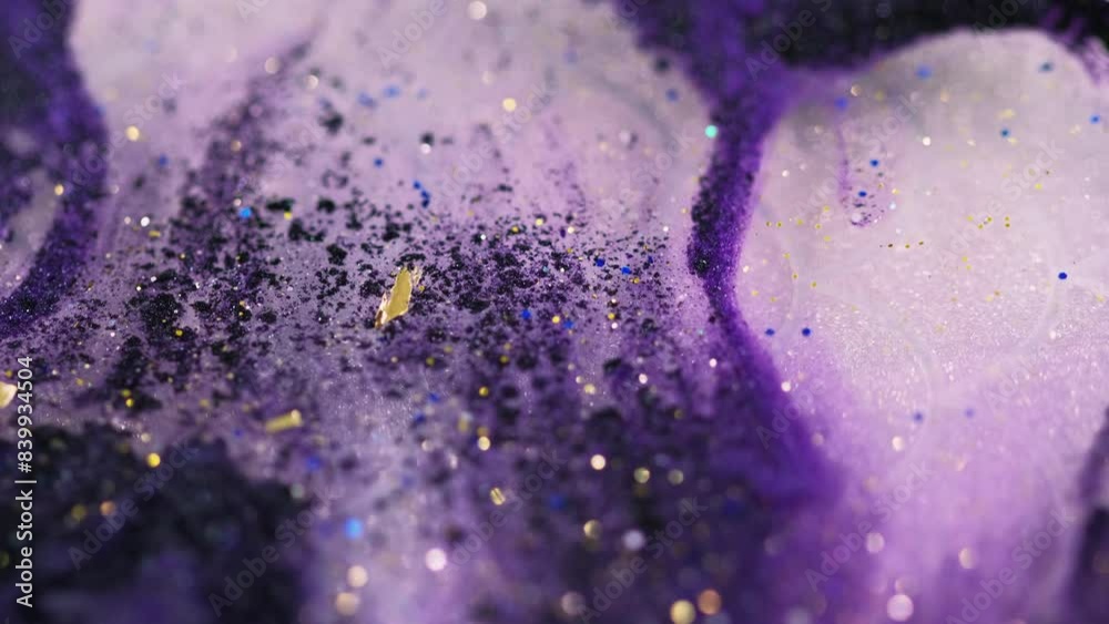 Glitter fluid spill. Shiny gloss. Blur purple black white color shimmering metallic sequin gold particles translucent paint liquid ink water flow motion abstract art background.