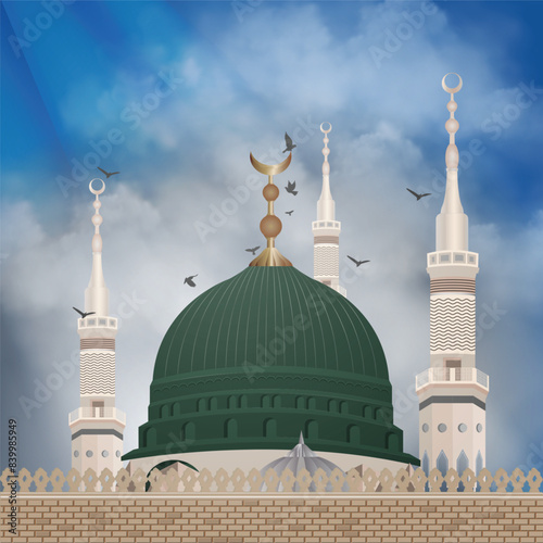 The green dome and minaret of the Prophet's Mosque.It is a historic mosque originally established and built by prophet Muhammad, situated in the city of Medina.