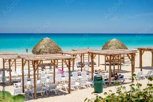 Sun loungers on the shores of the Anlantic Ocean in the city of Varadero on the island of Cuba