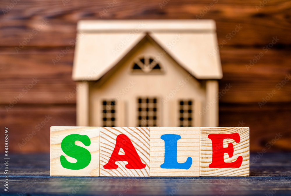 Wooden home and text on the cubes sale Wooden home and text on the cubes sale