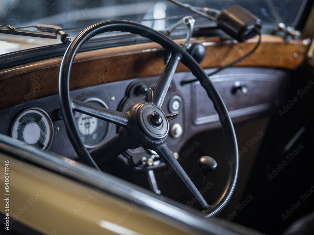 Dashboard and steering wheel of old-timer car Dashboard and steering wheel of old-timer car