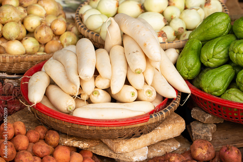 Fresh vegetables on display in a traditional market	