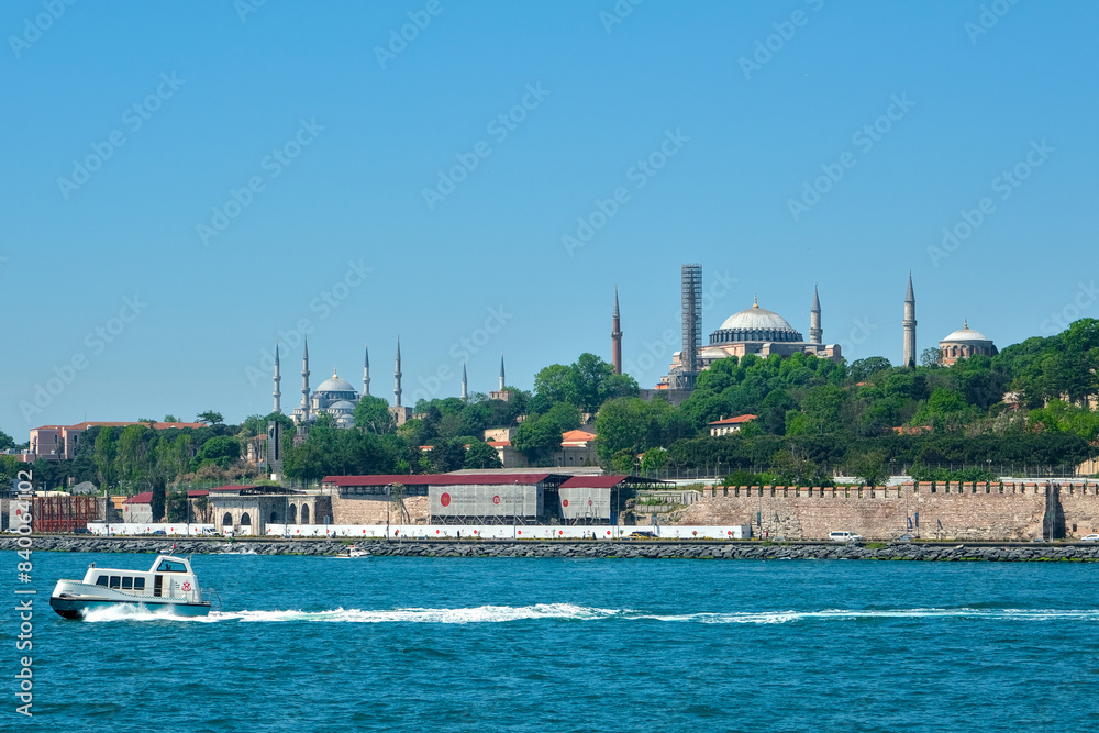 Istanbul. Boat on the Bosphorus. The Sultanahmet mosque is in the background.
