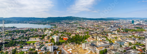 Zurich, Switzerland. Panorama of the city in cloudy weather. Summer day. Aerial view