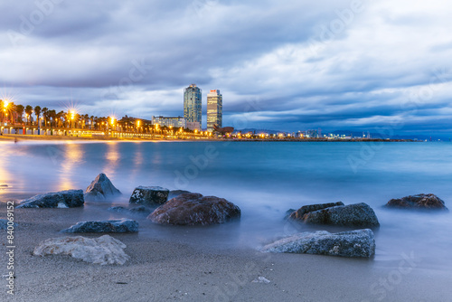 Long exposure photo of the sandy beach in Barcelona, Spain