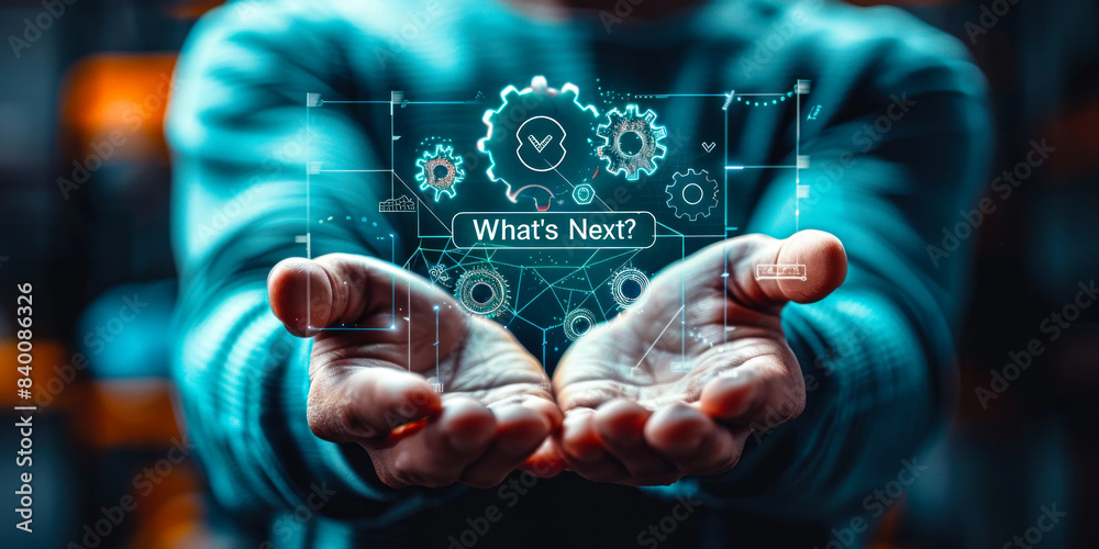 Person holds holographic icon depicting gears and the phrase What's(01)