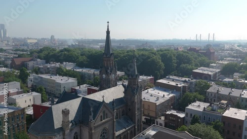 flying past church steeple towards McGolrick Park in Greenpoint Brooklyn