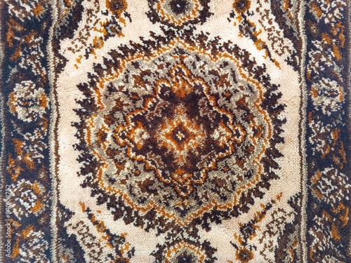 Close up photo of handwoven wool Persian carpet aith intricate patterns and beautiful design motifs photo