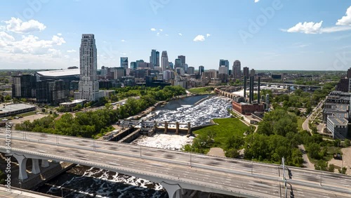 Minneapolis rush hour traffic on bridge over Mississippi River, drone hyperlapse