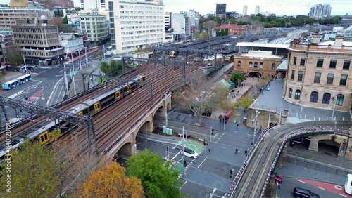 Landscape view of train entering railway tracks yard Central Station Sydney city CBD Haymarket Surry Hills Australia transport tourism commute photo