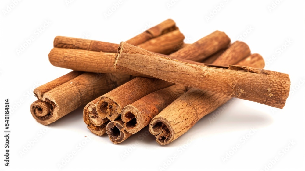 dried cinnamon sticks isolated on white background. spice ingredients concept for designer dried cinnamon sticks isolated on white background. spice ingredients concept for designer