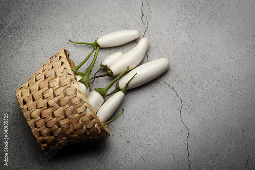 Close-up of organic white fresh Eggplant or Brinjal (Solanum melongena),  on a marble background. photo