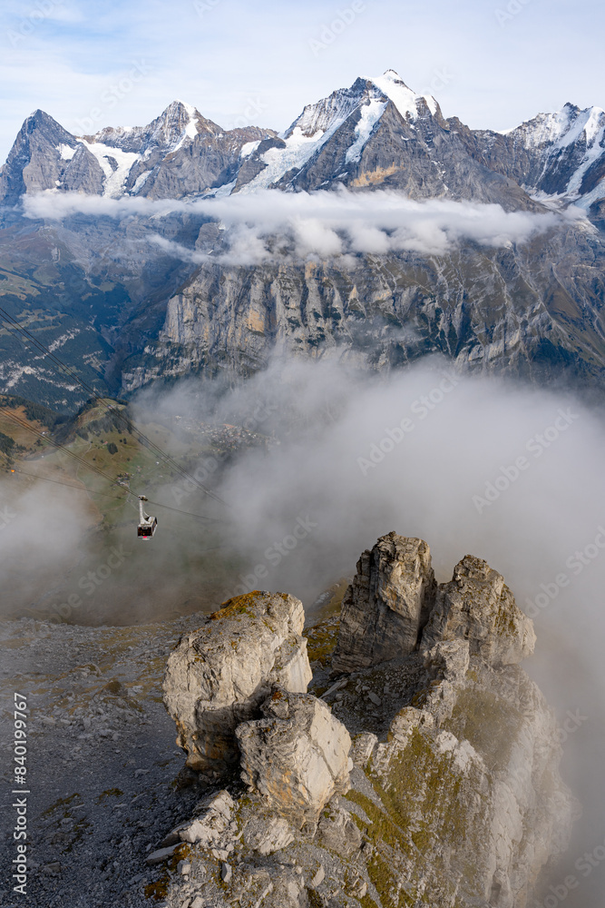 High mountain peaks range covered with snow in Switzerland. Swiss Alps and Lauterbrunnen valley