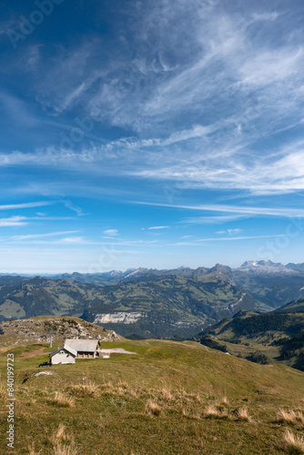 Obraz na płótnie Mountain hut and cable car seen from Fronalpstock summit, Switzerland. Swiss Alps iconic view w salonie