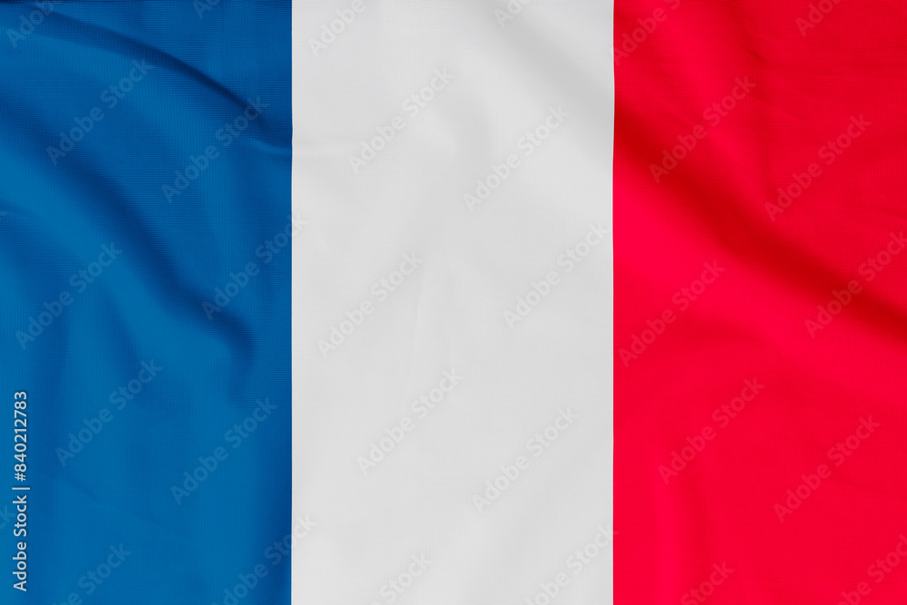 Flag of France (French Republic) with natural material creases as a background