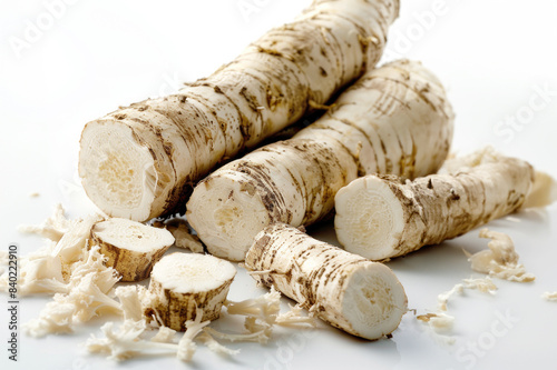 Horseradish root and grated horseradish isolated on white background