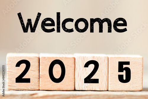 WELCOME 2025 arranged from wooden letters