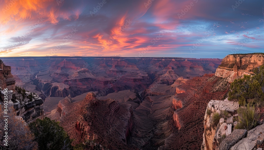 Fototapeta premium Breathtaking Sunrise Over Snow-Covered Grand Canyon During Winter