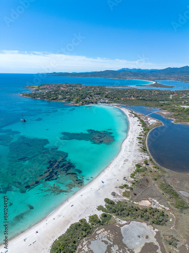 Lu Impostu beach seen from the drone, with crystal clear water and white sand, San Teodoro, Sardinia, Italy