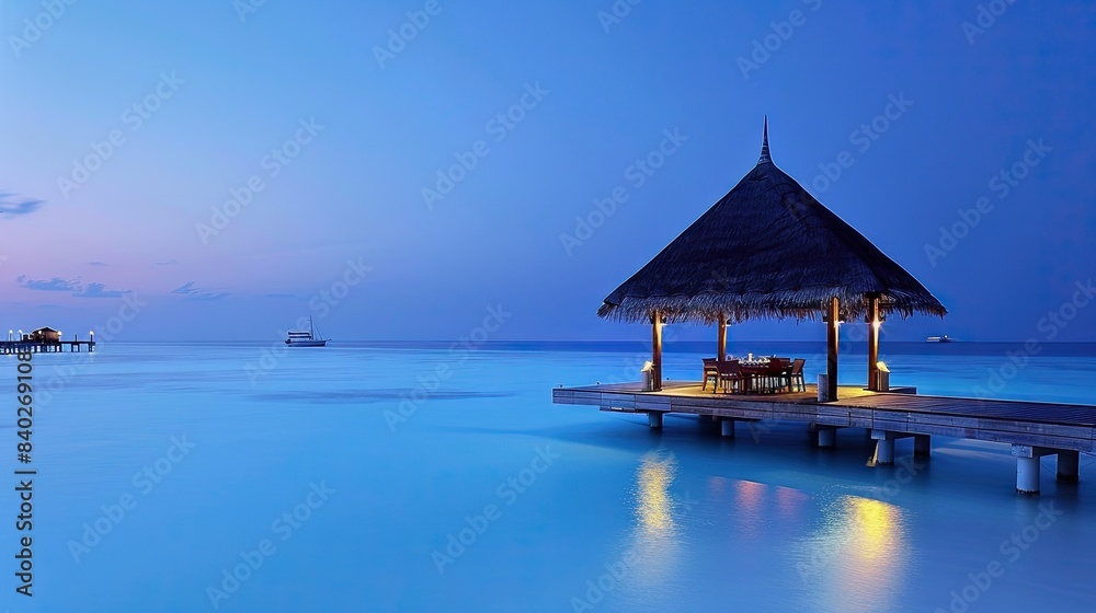 Twilight Dinner on a Maldivian Overwater Deck Twilight Dinner on a Maldivian Overwater Deck