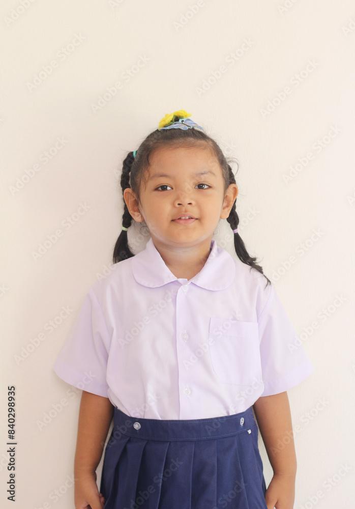 portrait of little girl wearing a Thai school uniform portrait of little girl wearing a Thai school uniform