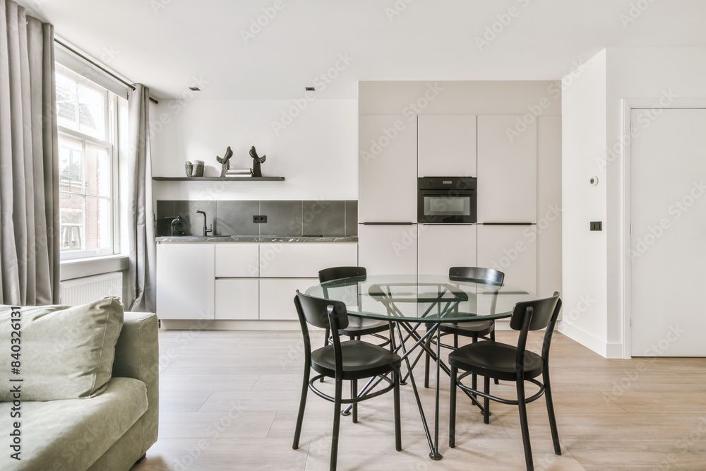 Modern kitchen and dining space with natural light Modern kitchen and dining space with natural light