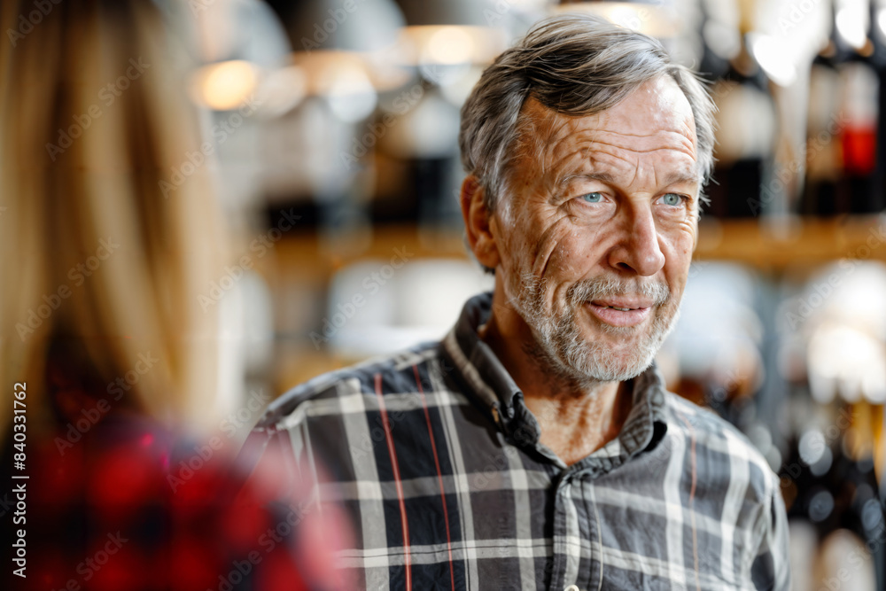 Mature Man Attending a Wine Tasting Session Mature Man Attending a Wine Tasting Session