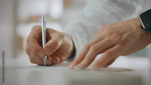 Pharmacy. Pharmacy medical worker uses skills to write with a pen while signing a doctor's prescription at a health center. European specialist issues paper documents and complies with service rules photo