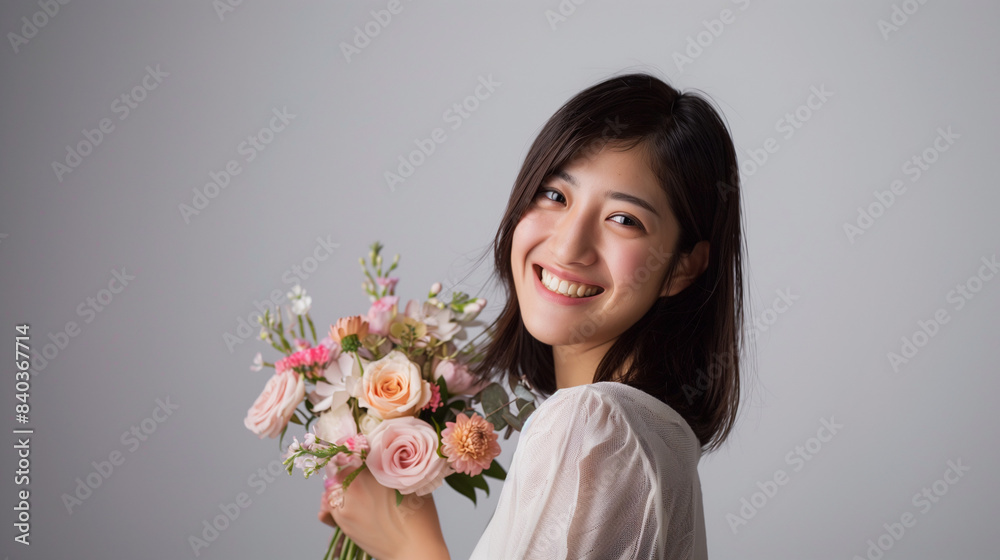 ブーケを持ったのアジア人女性