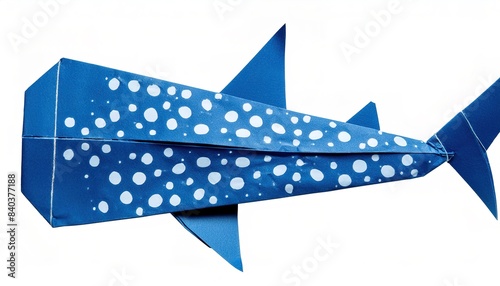 Animal concept paper origami isolated on white background of a whale shark - Rhincodon typus - is a slow-moving, filter feeding carpet shark and the largest known extant fish species with copy space